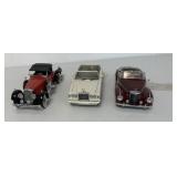 3 Franklin Mint car models