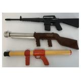 3 toy machine guns;