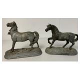 two metal horse figurines