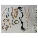box lot of necklaces, bracelets, ear rings, picks