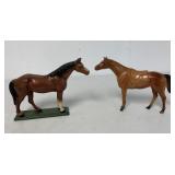 2 metal horse figures