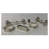 sterling napkin rings and baby rattles plus small