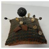 pin cushion with hat pins