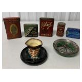 ashtrays, tobacco tins and baking powder tin