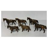 6 metal horses