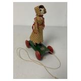 A Ted Toy pull toy woman