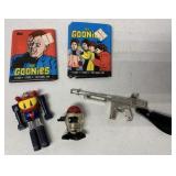 Goonies trading cards, windup robot, Tommy gun
