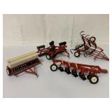 (4) 1/16 IH toys-Plows/Grain Drill