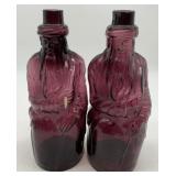 2 purple Poland Springs Mineral Water bottles