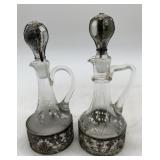 2 etched glass cruets, one marked Germany