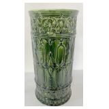 green pottery umbrella stand