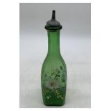 green glass enameled barber bottle