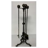 iron fireplace tools and stand