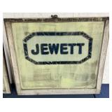 Jewett automobile decal on garage window