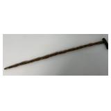 35" knotty wood and sterling handle cane