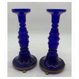 pair of blue glass candle sticks