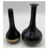 2 small black vases