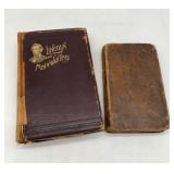 leather bound books on Lincoln and Pirates