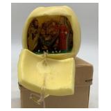 Nativity scene inside small apple made in Austria