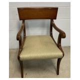 Mahogany armchair with olive upholstery