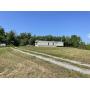 1+/- Acre Lot & Neglected Mobile Home