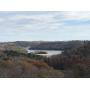 PARTIALLY CONSTRUCTED HOME AND 11+/- ACRES