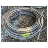 1 ROLL OF USED 1.25" FLOW LINE