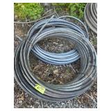 1 ROLL OF USED 1.25" FLOW LINE