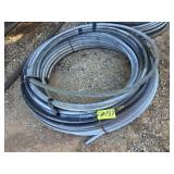 1 ROLL OF USED 1.25" FLOW LINE