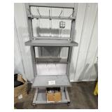 Rolling rack with metal clips in box