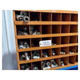 Hydraulic Hose fittings with brown metal shelf