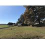 HOME and BLDGS. ON 5.7 ACRES