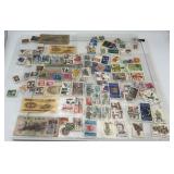 4 sheets of vintage stamps & foreign currency