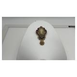 Cameo w/ topaz & ruby crystals brooch