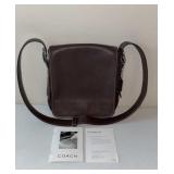 Coach purse w/ paperwork