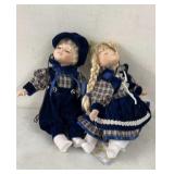 2 Porcelain Dolls on Swing