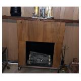 Electric fireplace with tools