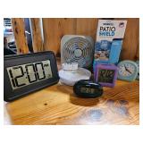 Box of essentials - Bug Repeller, clocks, light