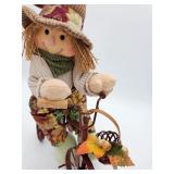 Adorable Scarecrow on a bike
