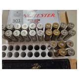 .338 Win Mag - 18 live rounds & 25 Brass