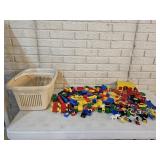 Assortment of Legos and Shopping Basket