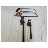 2 Pipe Wrenches and 2 Hand Saws