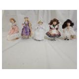 5 Avon and Russ Small Porcelain Dolls