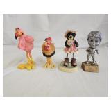 4 Collectible Bobbleheads