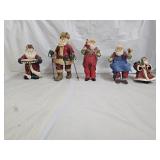 Clothique and Resin Santa Claus Figures
