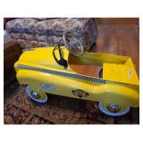 yellow pedal car