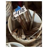 Bucket of approx 25 Concrete Stakes