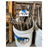 Bucket of approx 25 Concrete Stakes
