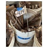Bucket of  approx 25 Concrete Stakes