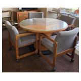 Round oak conference table w/4 rolling chairs